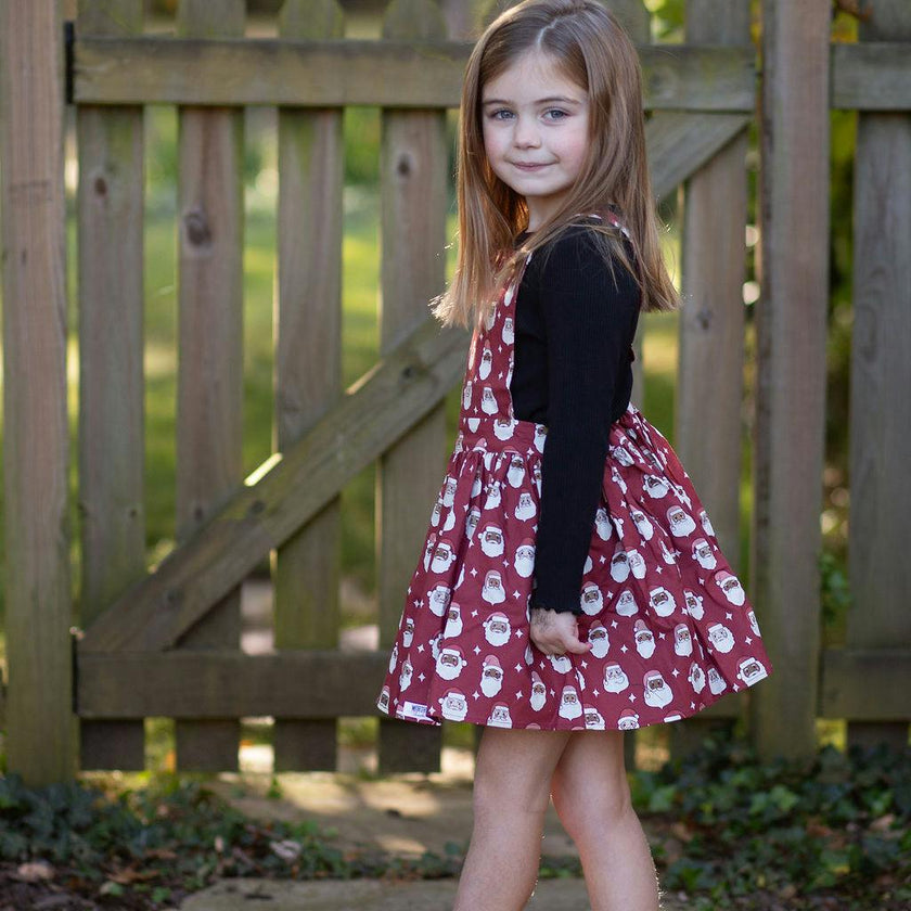 Holiday Pinafore Dress in Christmas Santas