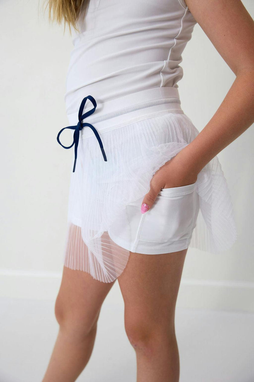 white pleated skort