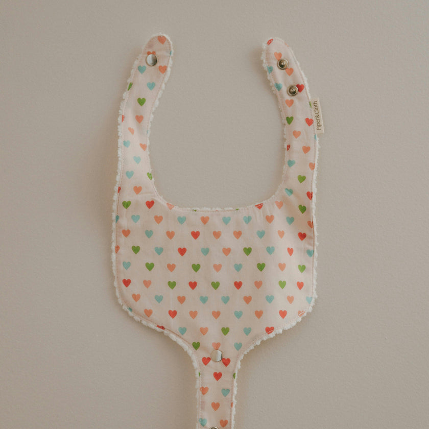 Soothe & Snap Pacifier Bib | Sweetheart Parade