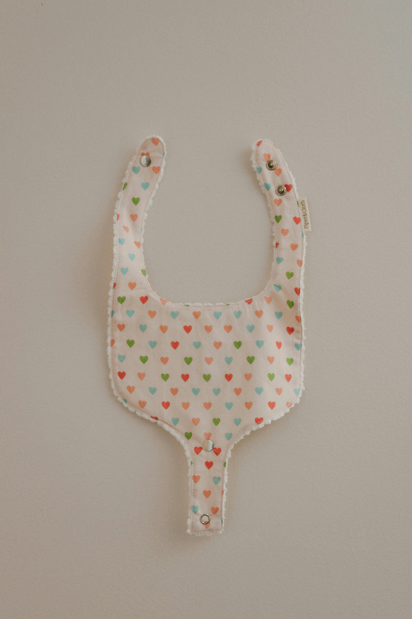 Soothe & Snap Pacifier Bib | Sweetheart Parade