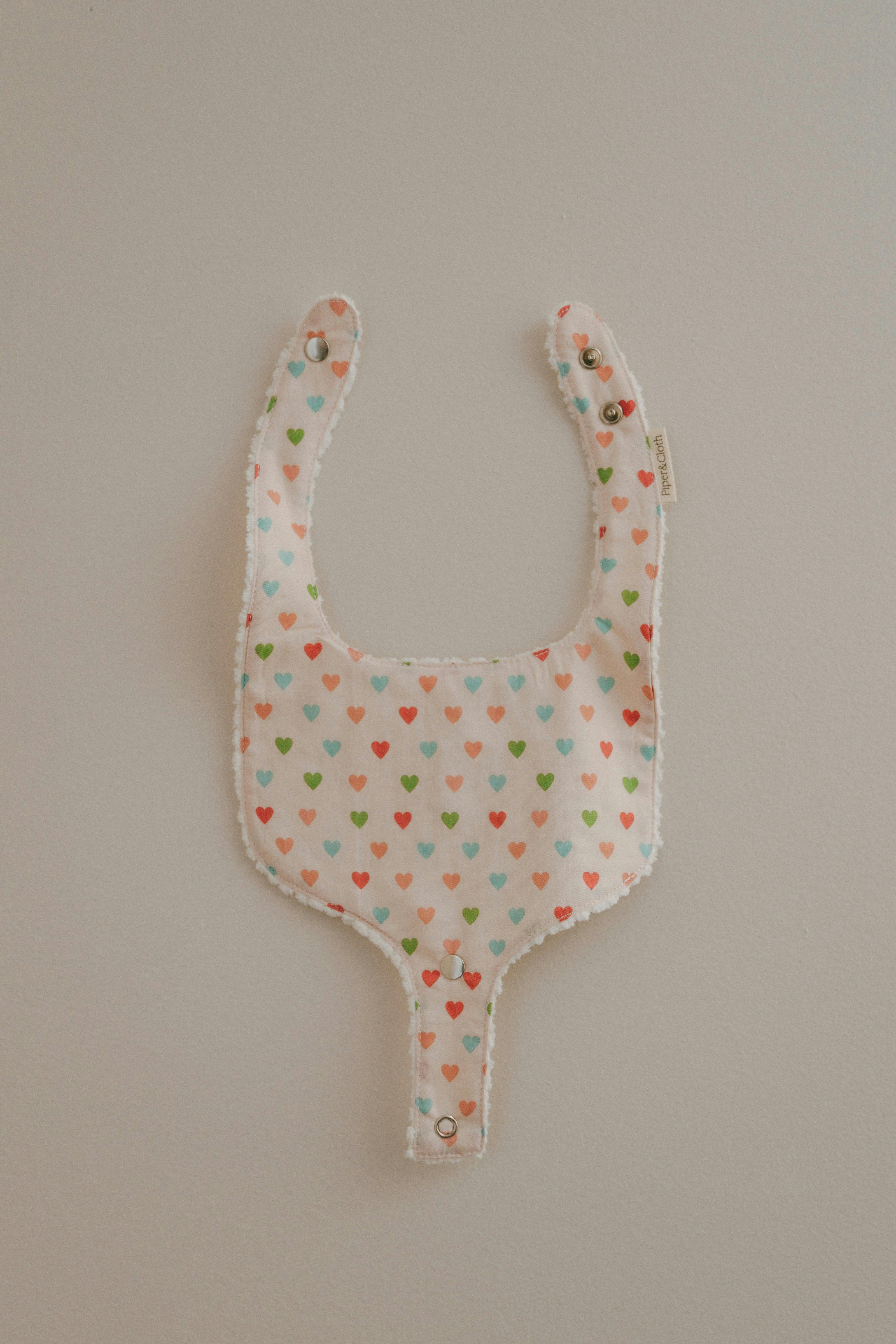 Soothe & Snap Pacifier Bib | Sweetheart Parade
