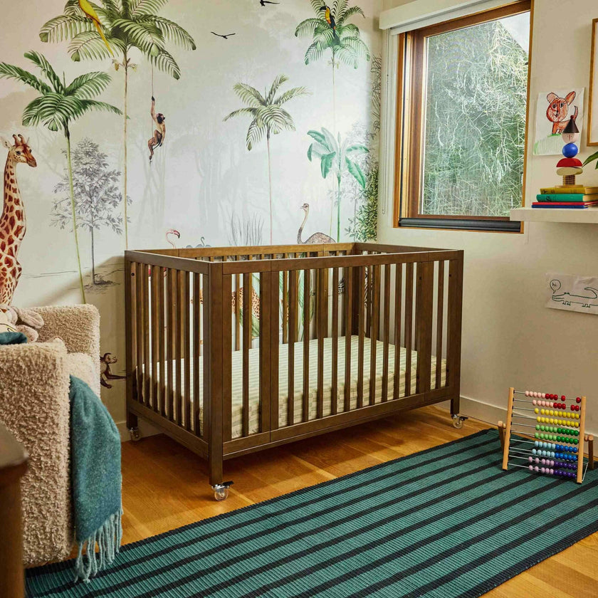 Rolli 9-in-1 Convertible All-Stages® Crib with Bassinet & Toddler Bed Conversion Kits in Natural Walnut