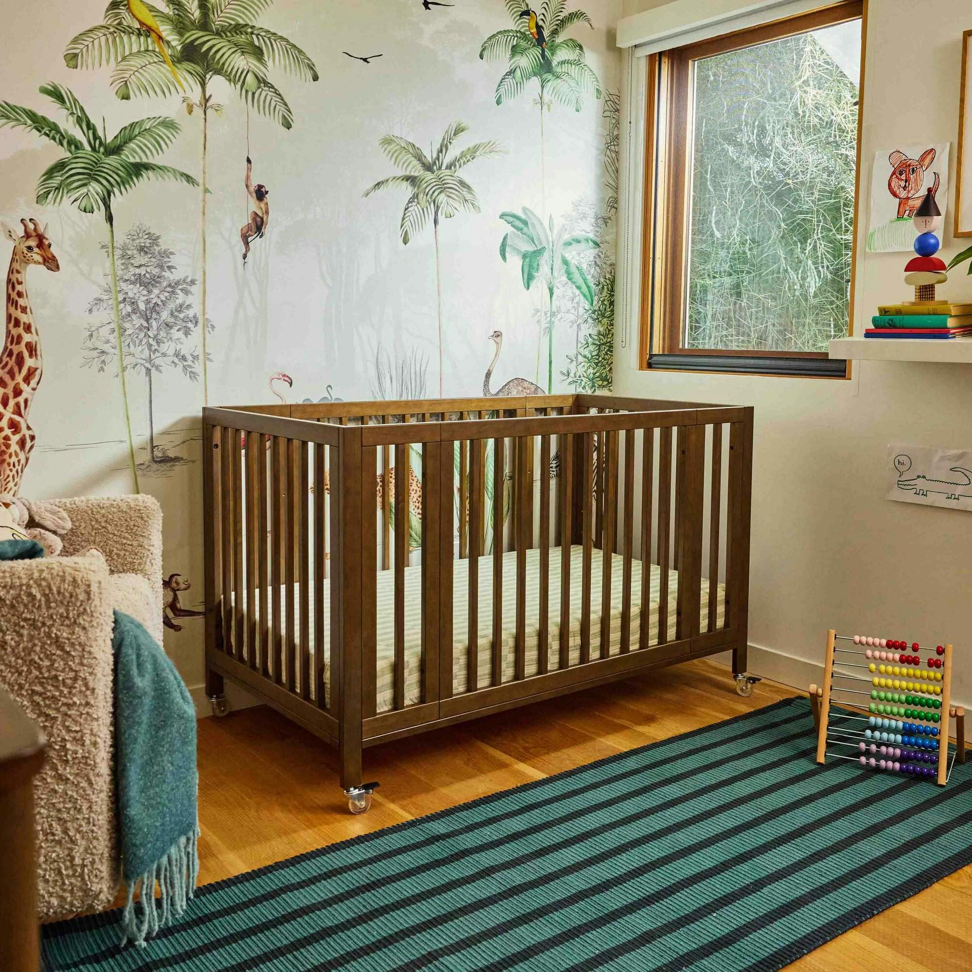 Rolli 9-in-1 Convertible All-Stages® Crib with Bassinet & Toddler Bed Conversion Kits in Natural Walnut