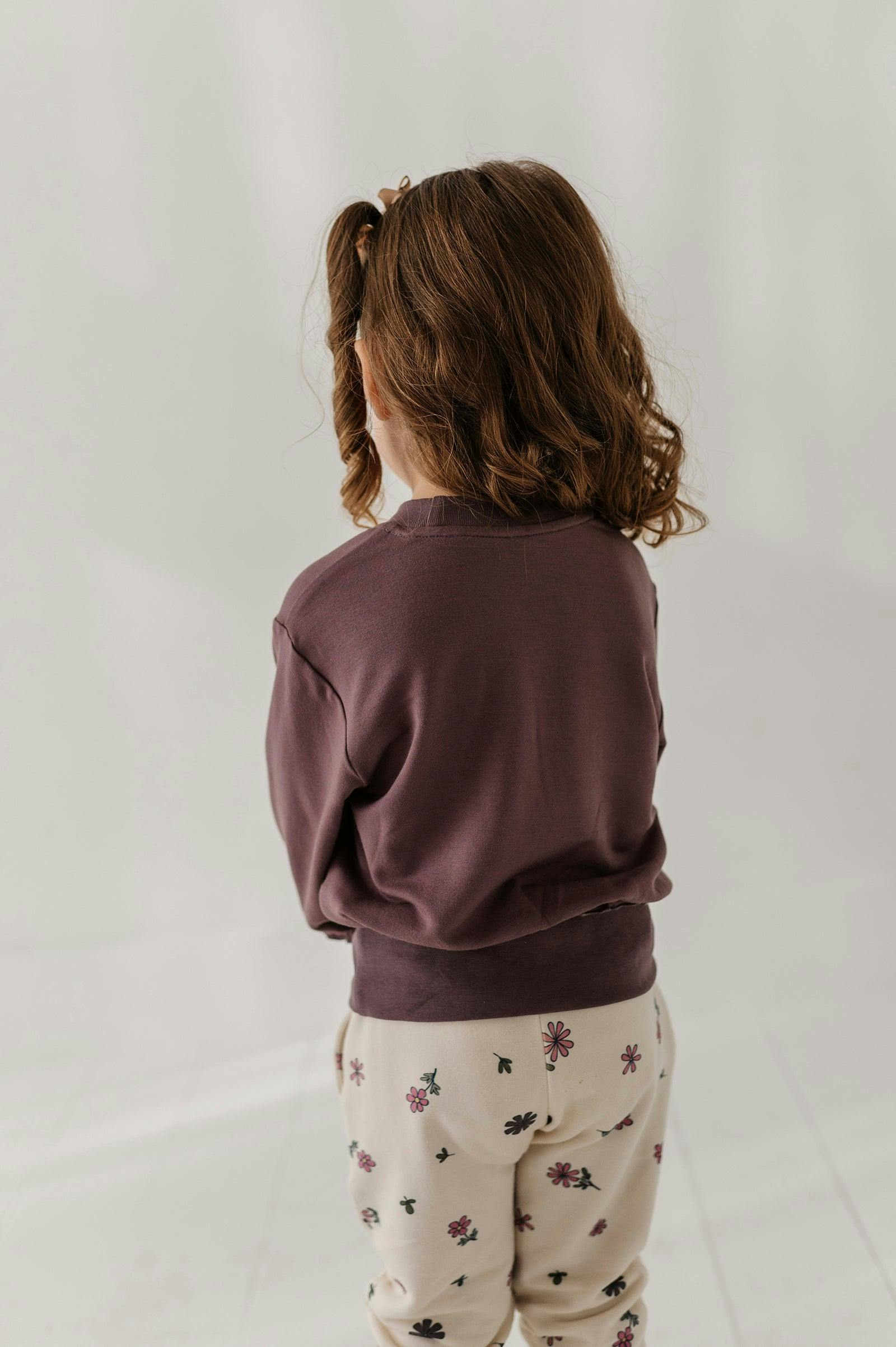 Girls Ruffle Hem Sweatshirt in Butterfly