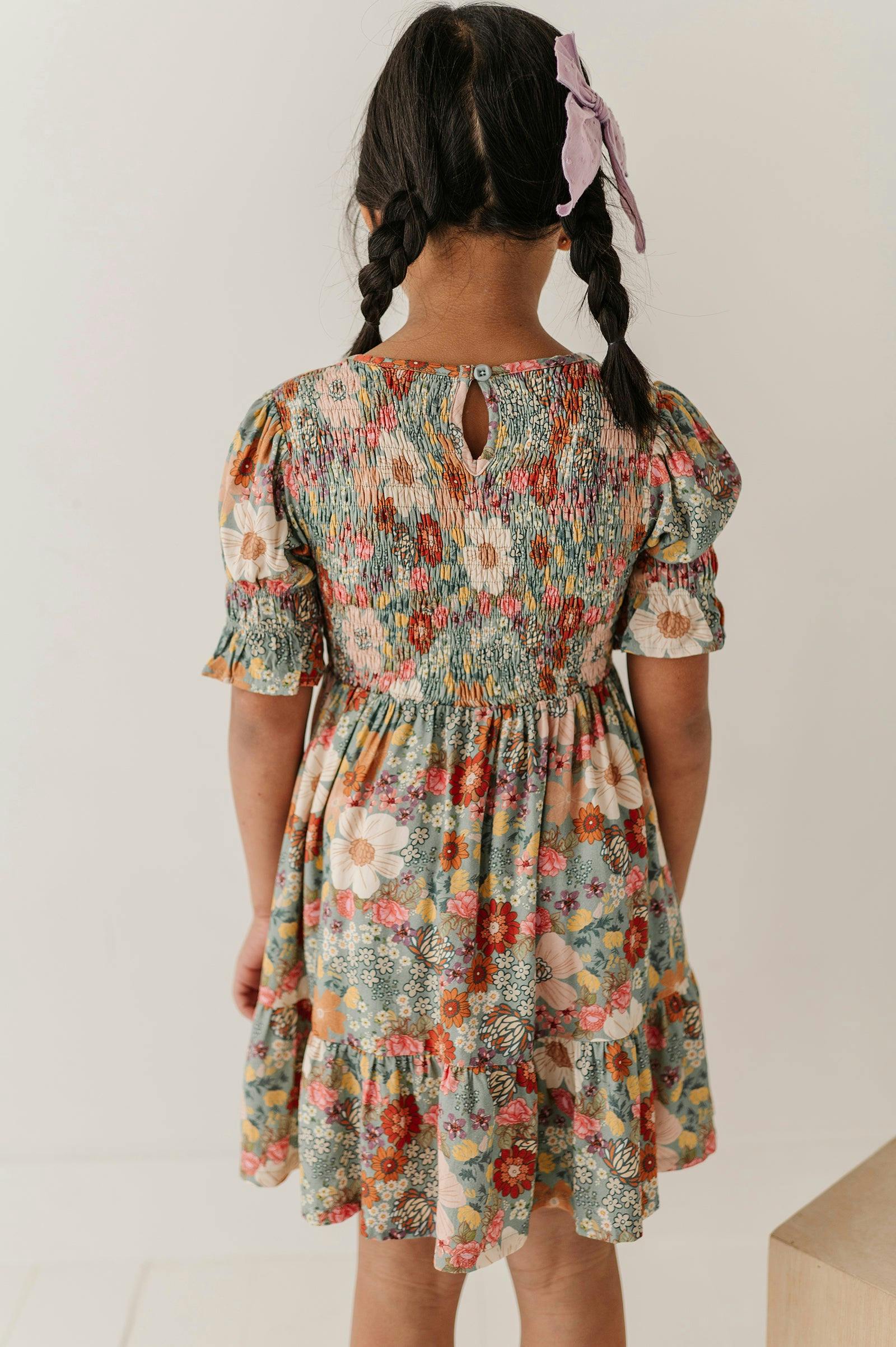 Girls Short Sleeve Smocked Babydoll Dress in Hedde Floral