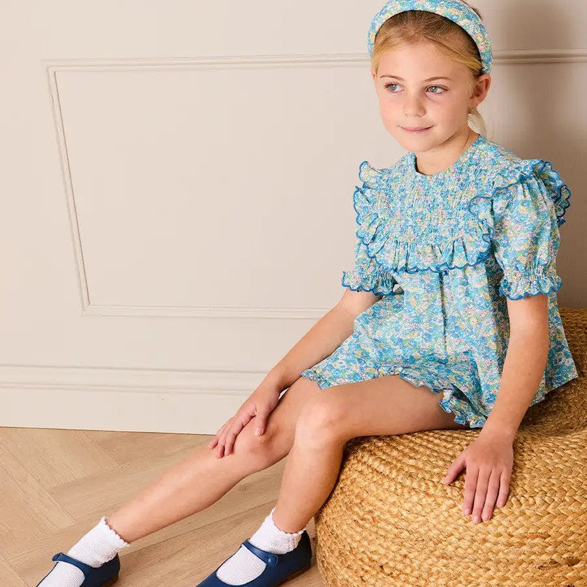 Leontyne Floral Scalloped Smocked Detail Short Sleeve Blouse in Blue Made with Liberty Fabric (2- 10yrs)
