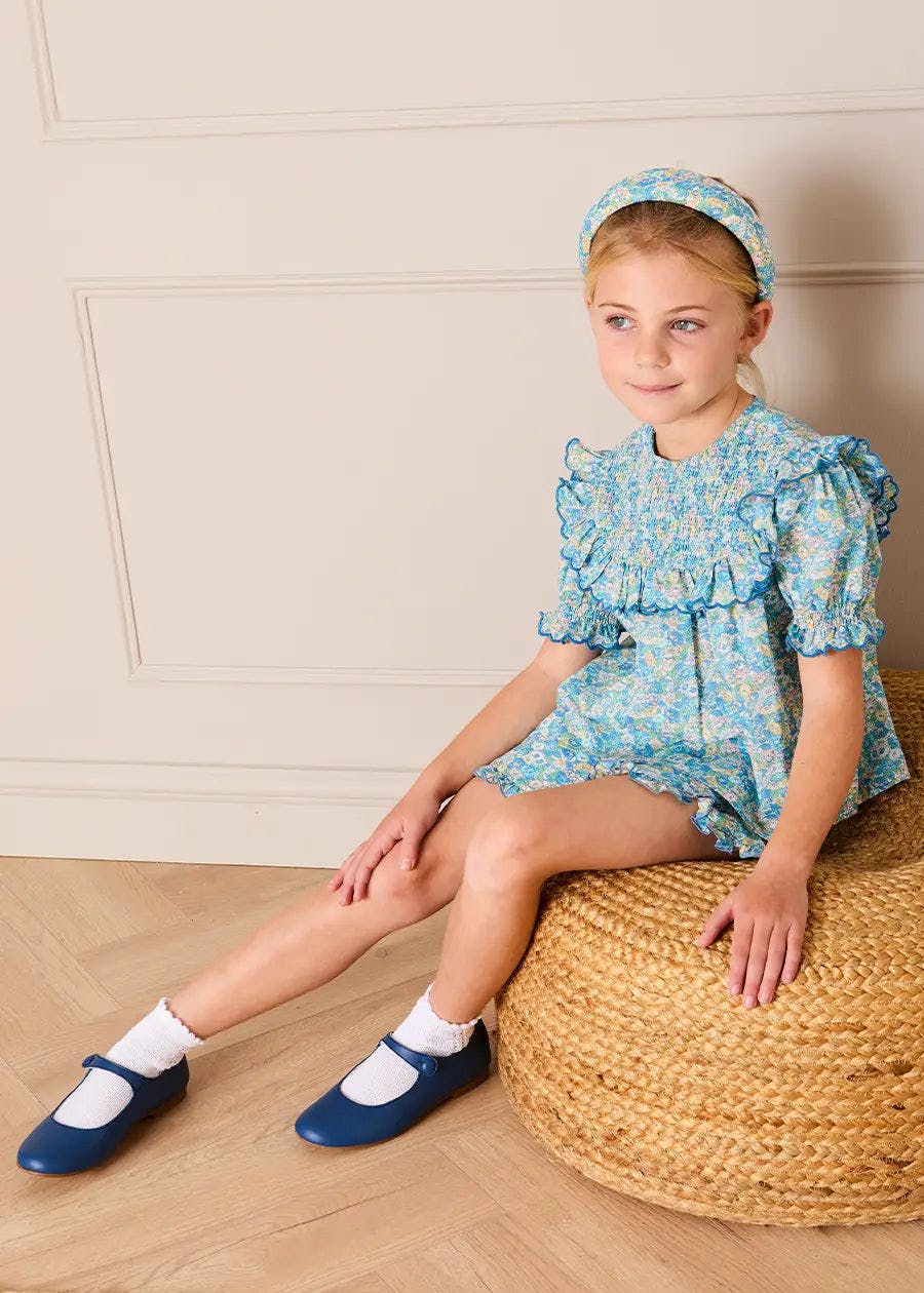 Leontyne Floral Scalloped Smocked Detail Short Sleeve Blouse in Blue Made with Liberty Fabric (2- 10yrs)