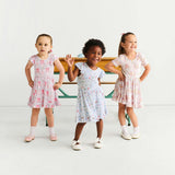 Gail Tie Back Ruffled Twirl Dress