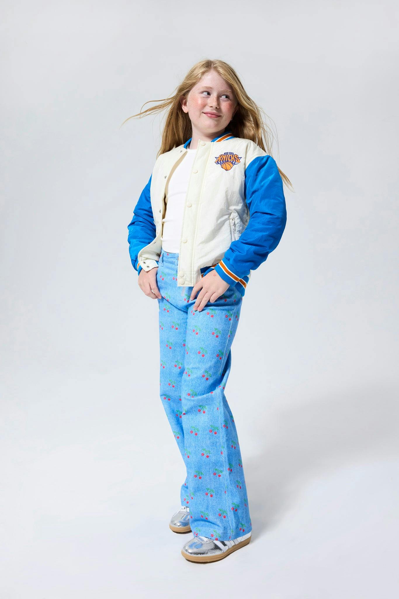 New York Knicks Basketball Youth Bomber Jacket in Sugar Swizzle and Blue