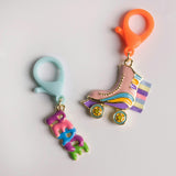 Enamel Roller Skate and Peace Word Backpack Charm Set of 2
