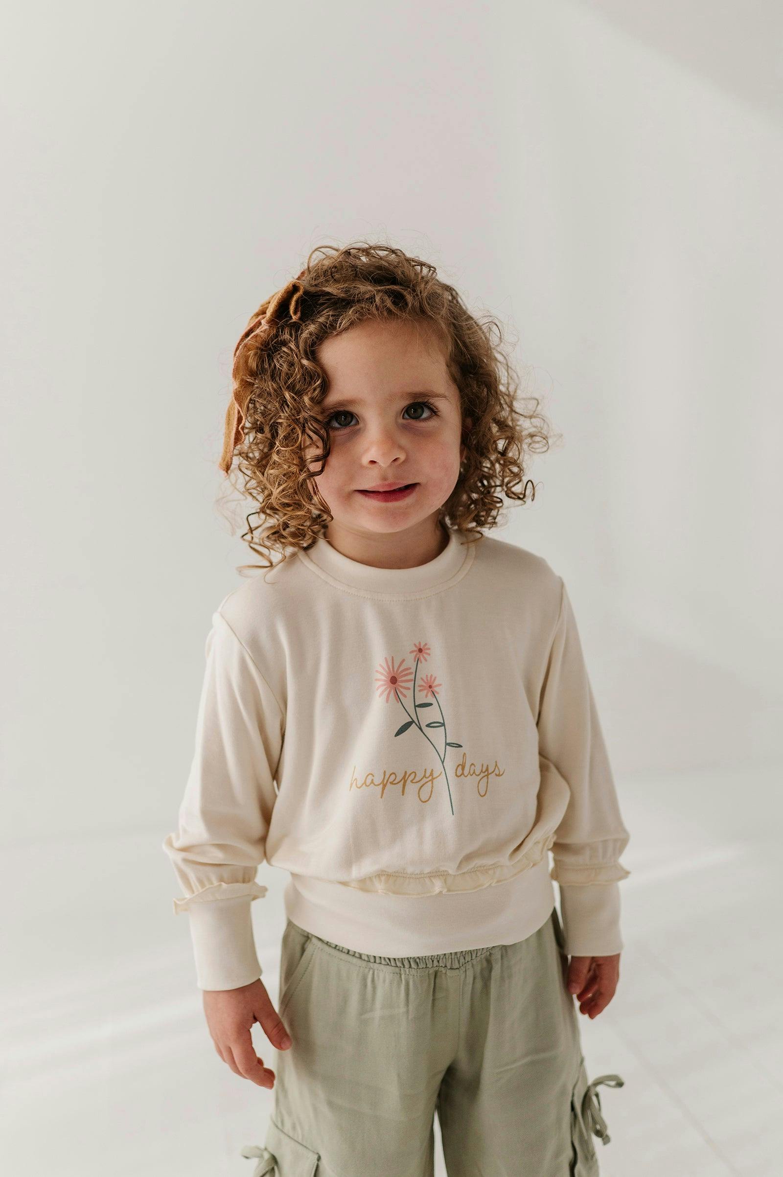 Girls Ruffle Hem Sweatshirt in Happy Days