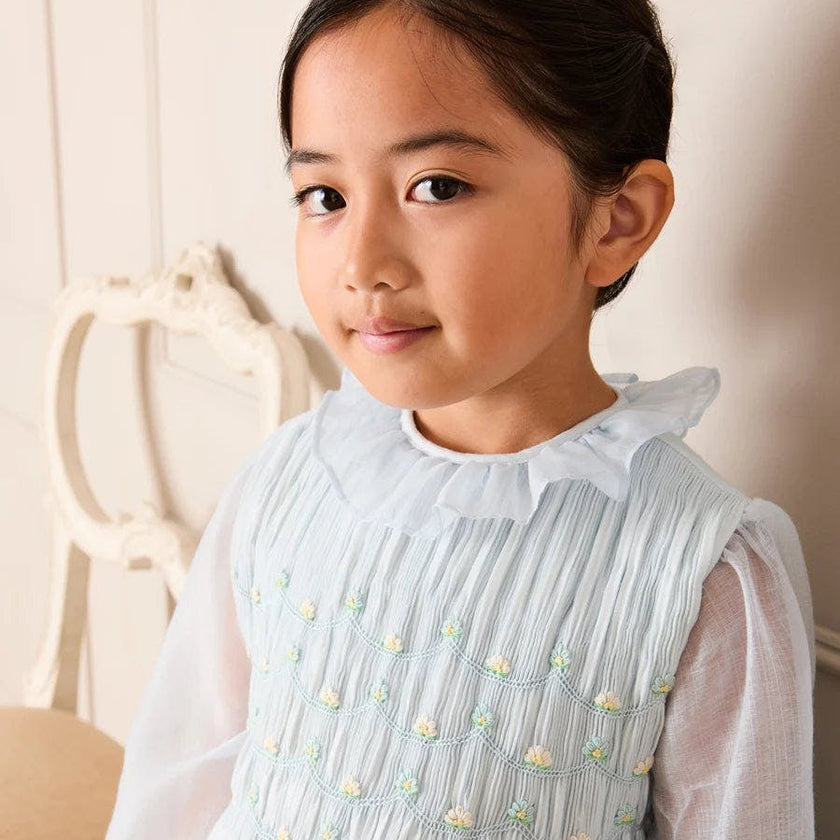Daisy Embroidered Hand Smocked Long Sleeve Dress in Blue (18mths-8yrs)