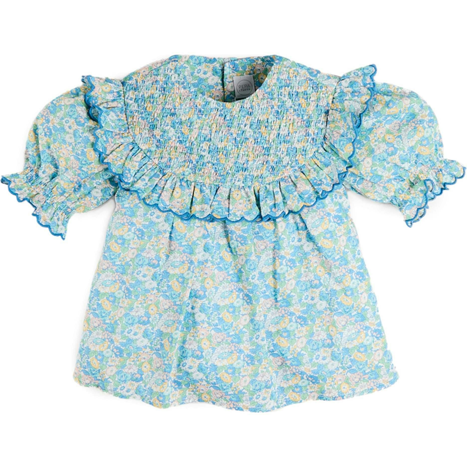 Leontyne Floral Scalloped Smocked Detail Short Sleeve Blouse in Blue Made with Liberty Fabric (2- 10yrs)