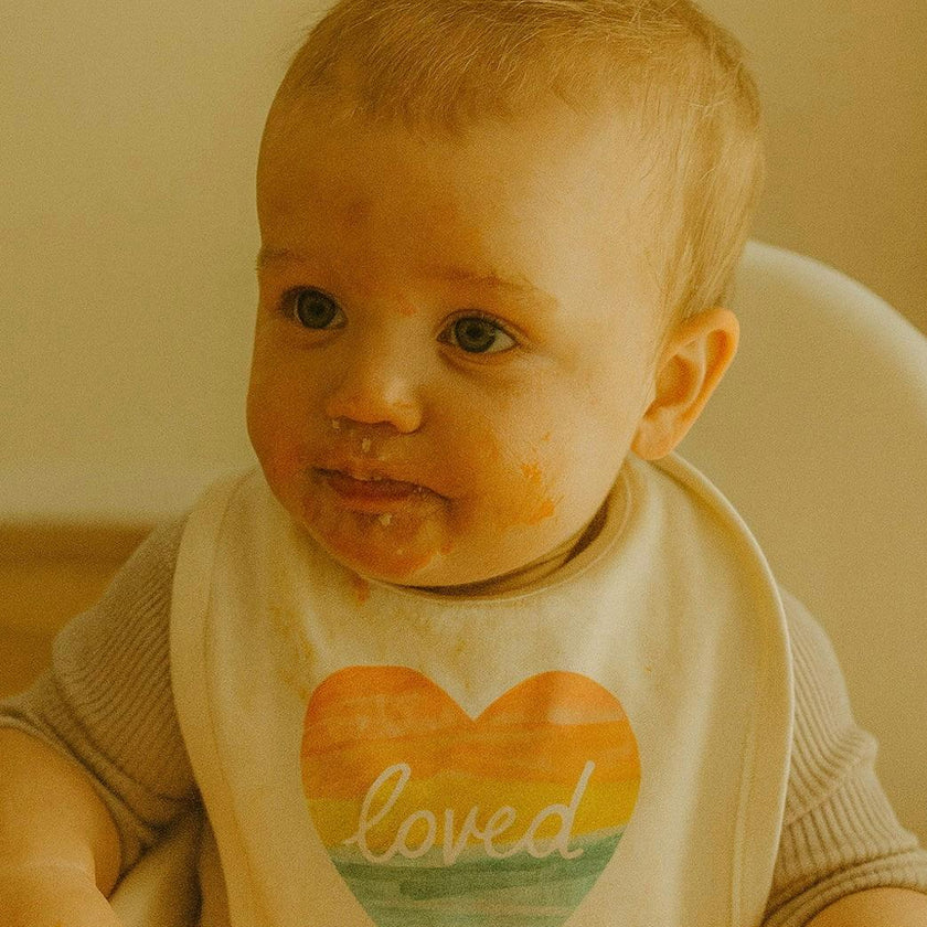 graphic bib | loved rainbow heart