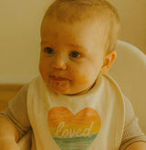 graphic bib | loved rainbow heart