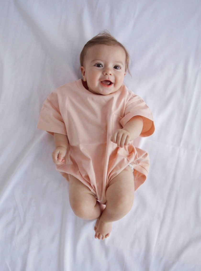 Cory Pocket Romper in Peach Powder