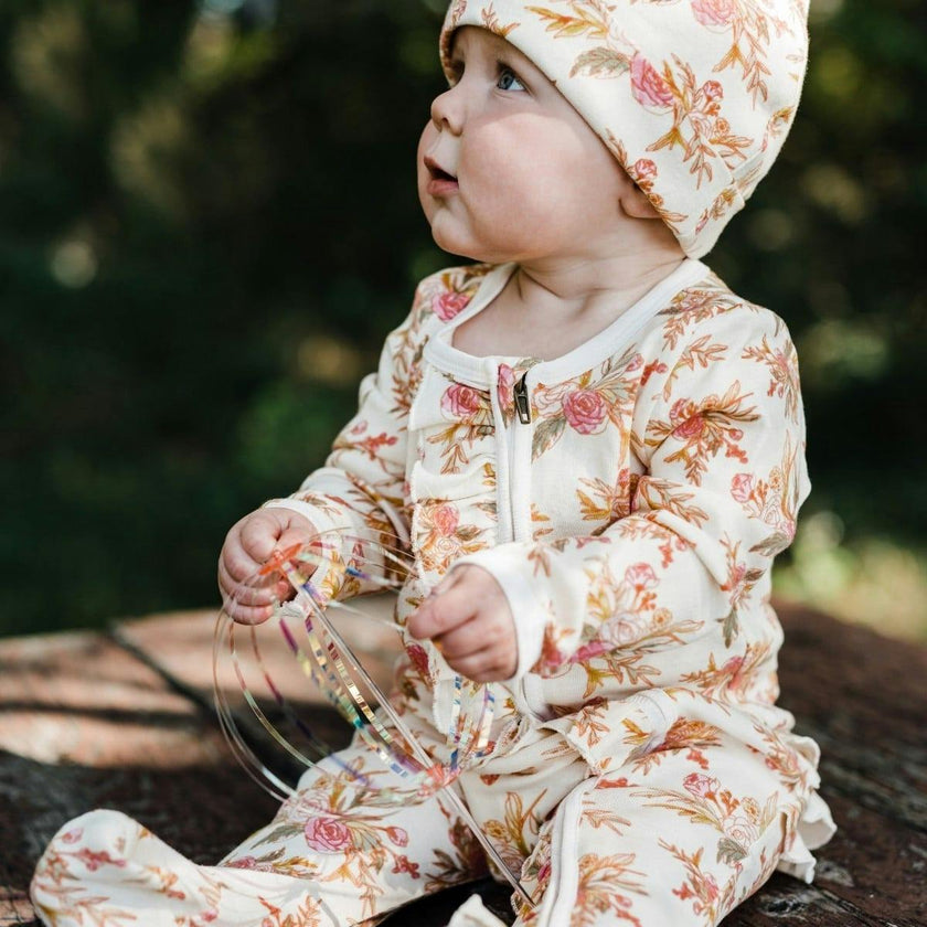 Goose Luxe Stretch Ruffle Footed Romper