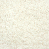 Kiwi Gliding Ottoman in Cream Shearling with Light Wood Base