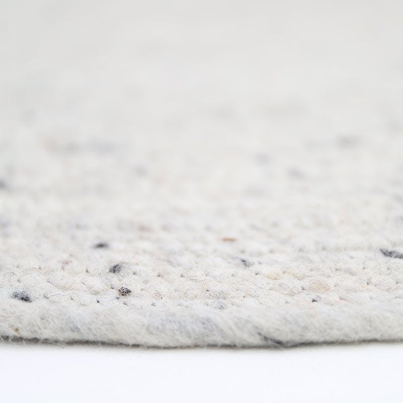 Neethu Hand-Crafted Felted Wool Round Rug, Natural