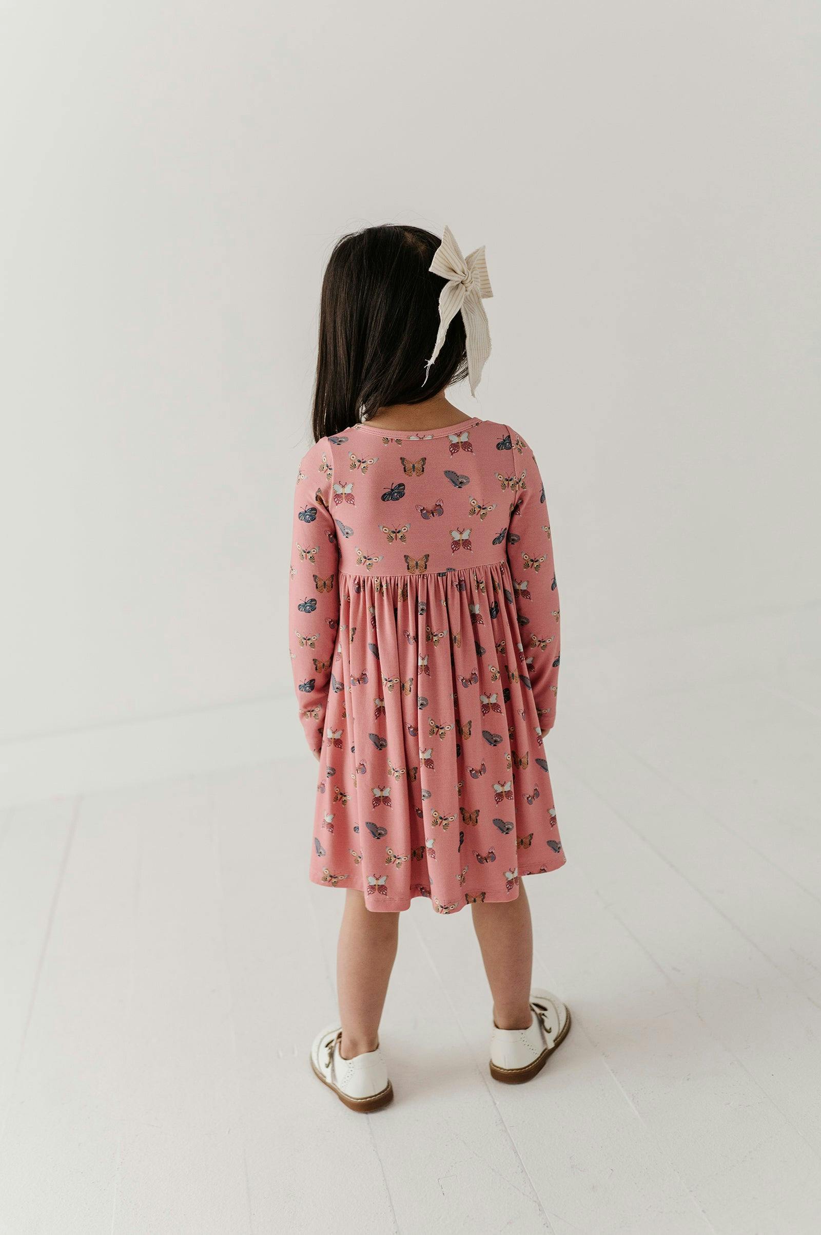 Girls Long Sleeve Henley Dress in Butterfly Bloom