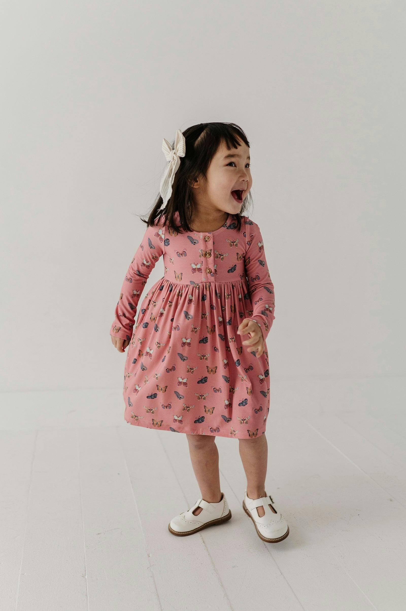 Girls Long Sleeve Henley Dress in Butterfly Bloom