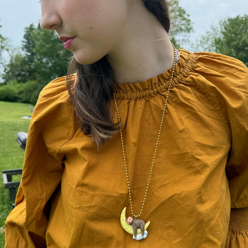 GLOW-IN-THE-DARK SLEEPY SLOTH NECKLACE