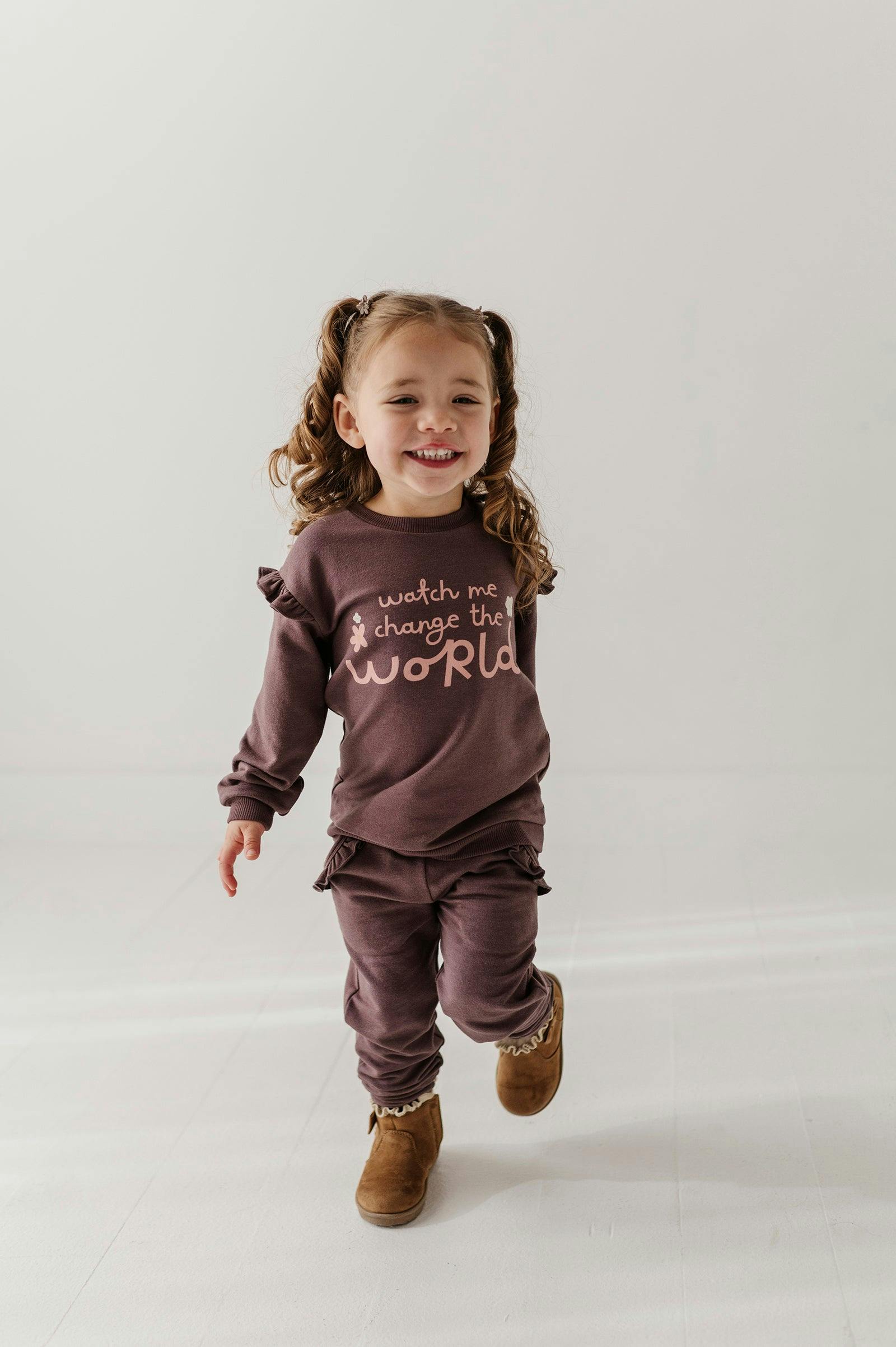 Girls Ruffle Sweatshirt in Watch Me Change The World