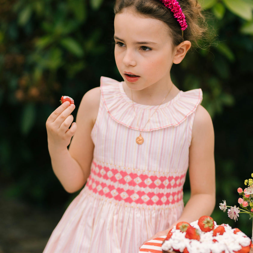 Capucine Pink Yellow Stripe Sleeveless Smocked Dress