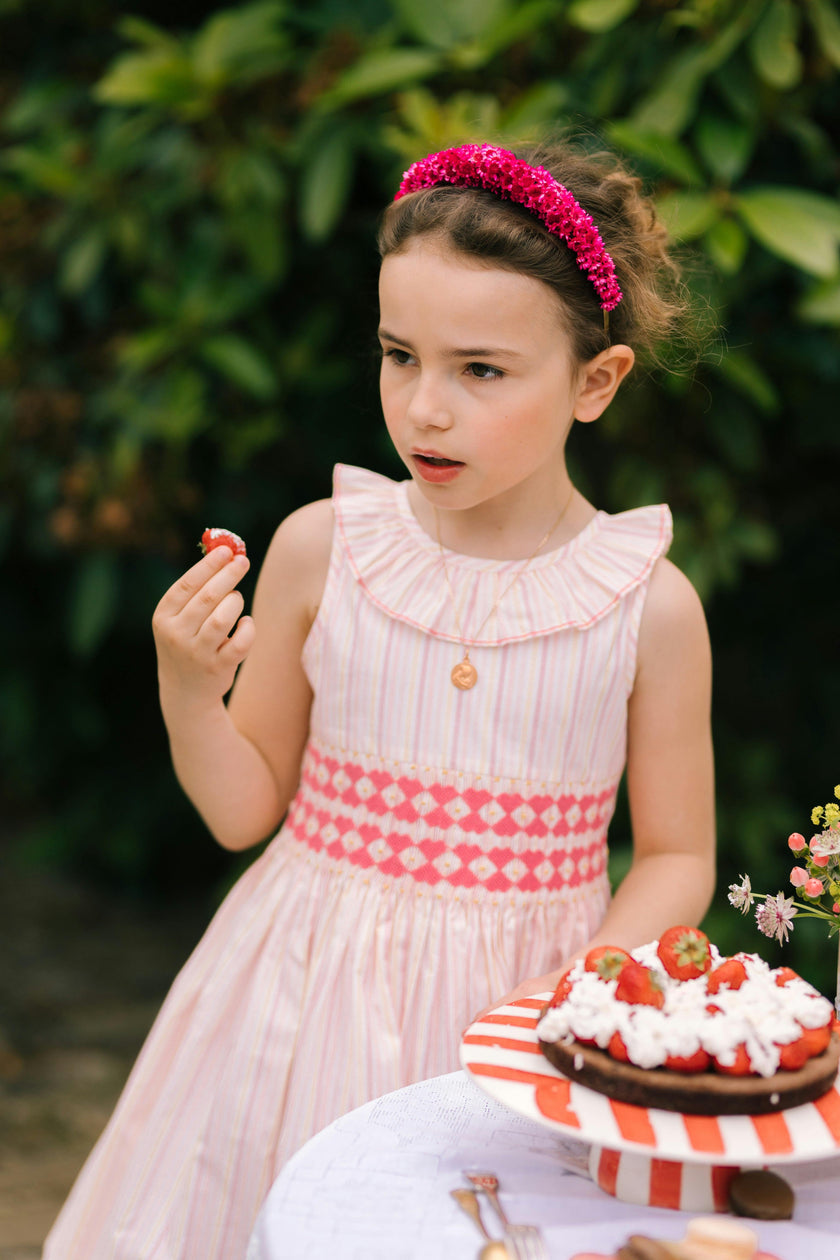 Capucine Pink Yellow Stripe Sleeveless Smocked Dress