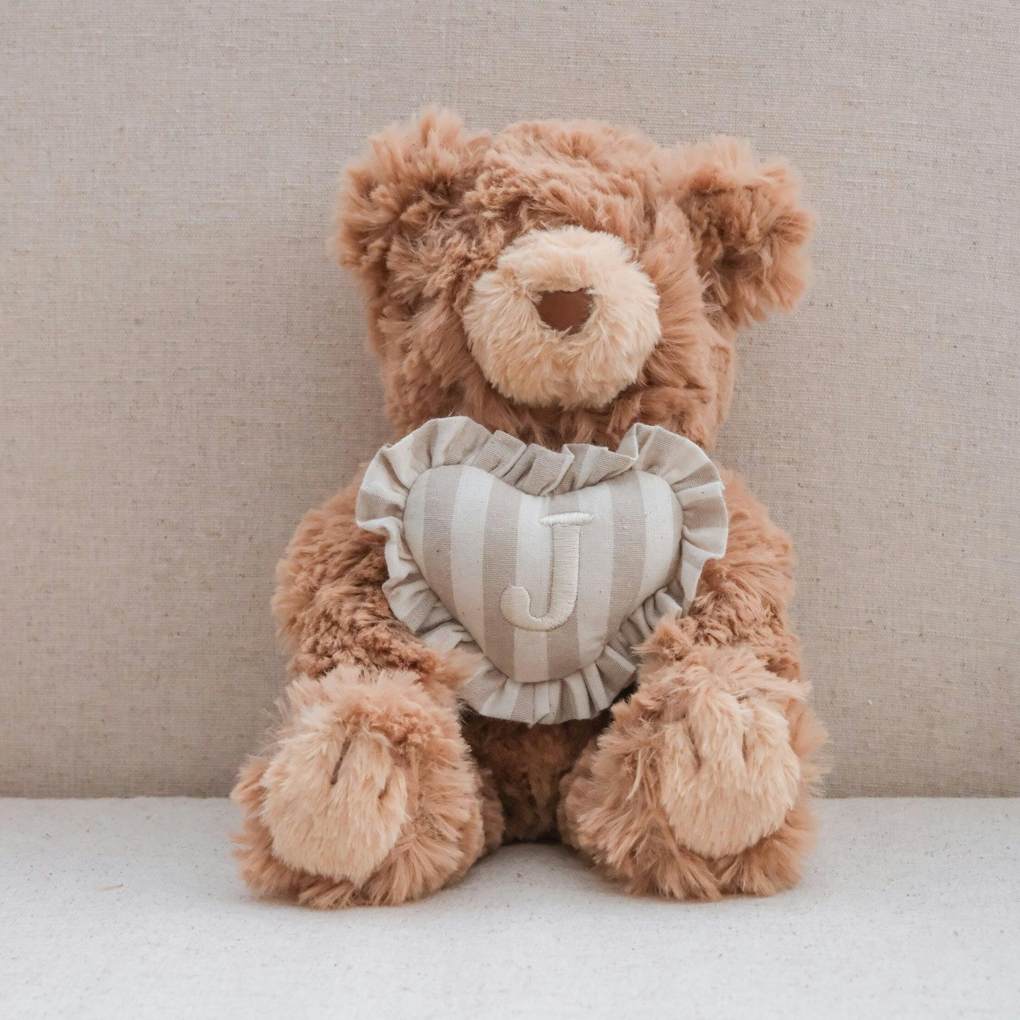 INITIAL TEDDY
