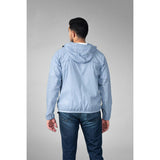 Powder blue full zip packable rain jacket and windbreaker