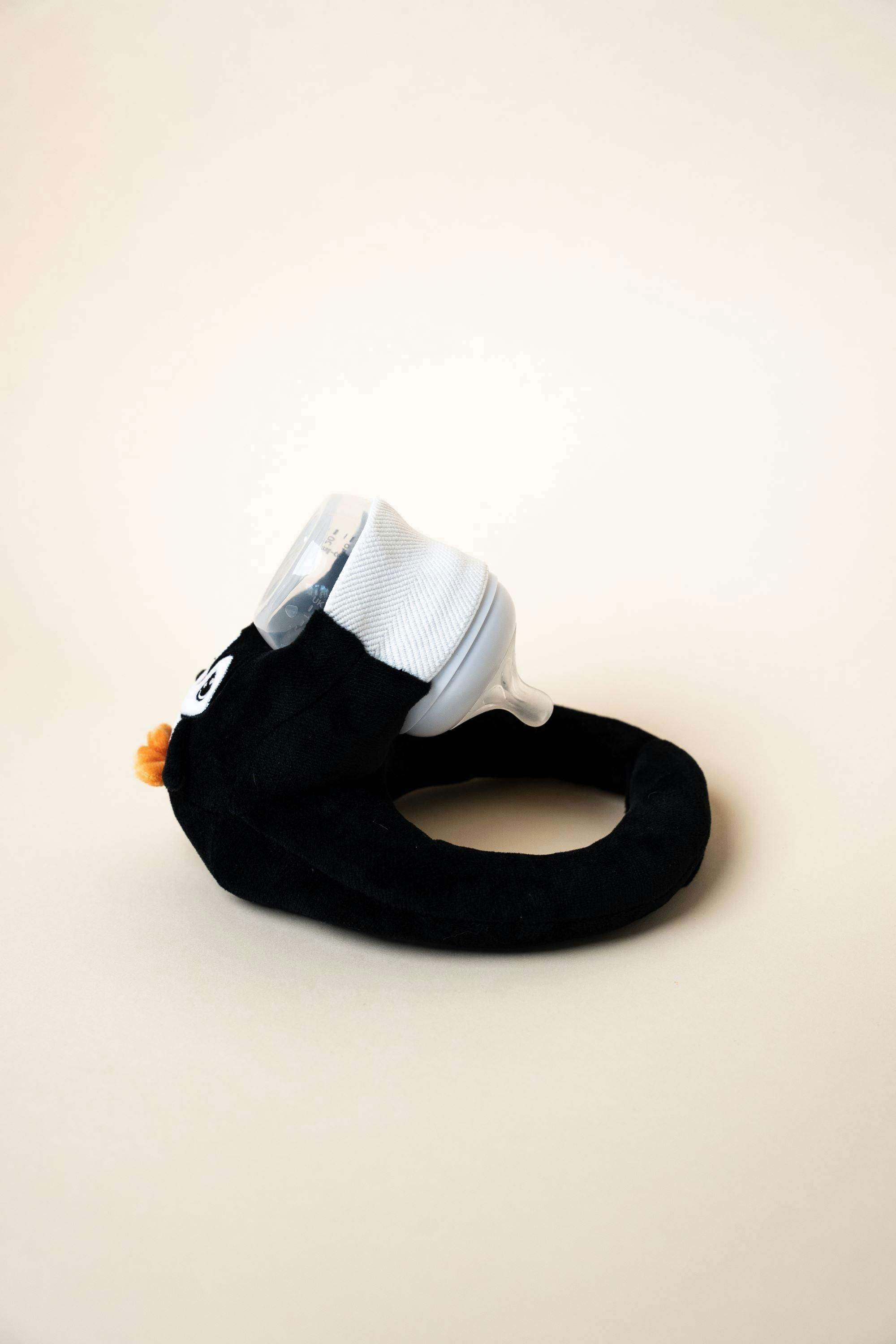 Baby Bottle Pillow Holder For Parents - Penguin