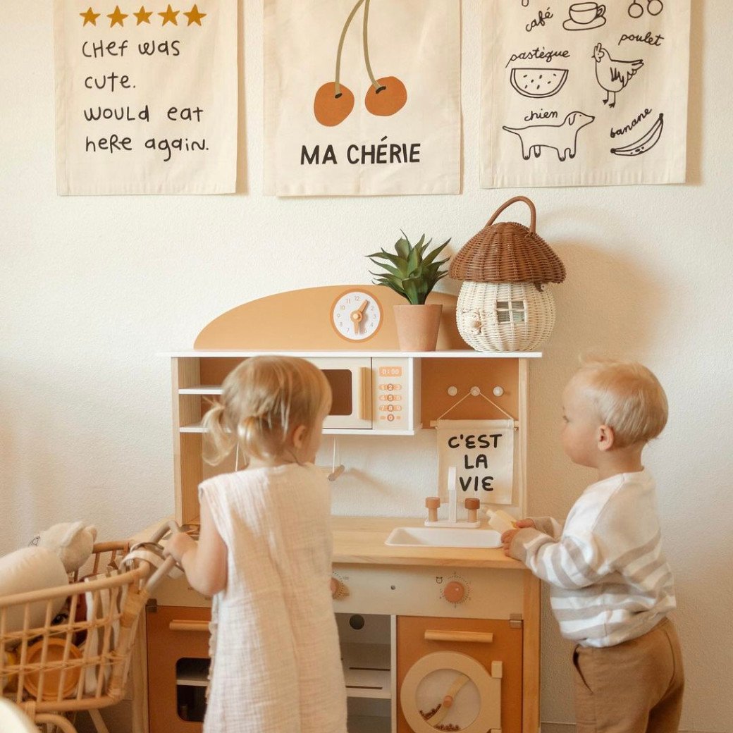 Imani + Kids brand logo