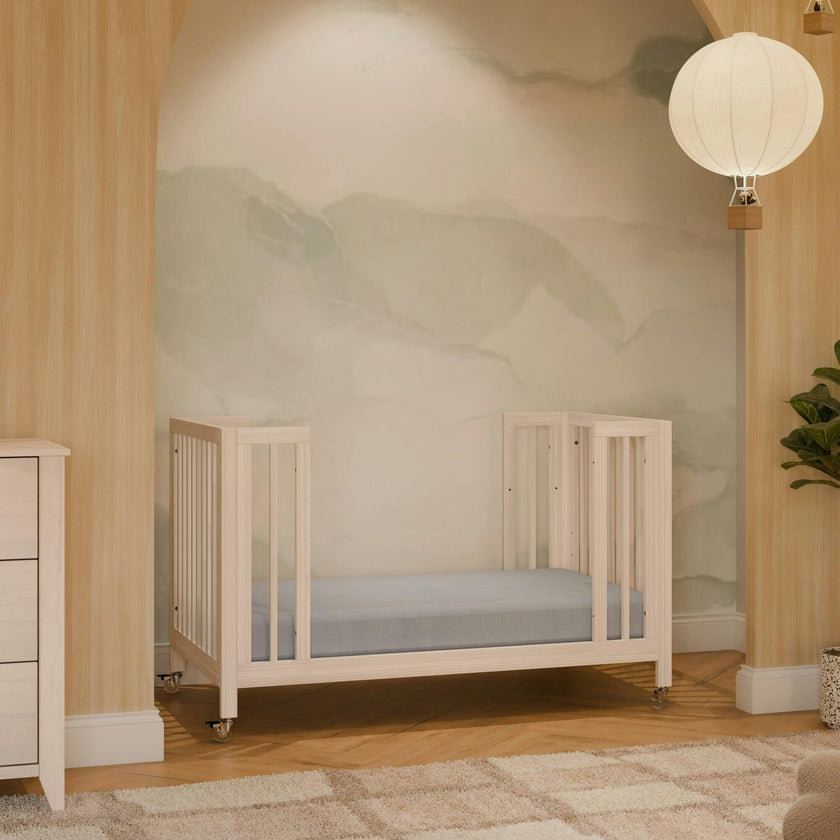 Rolli 9-in-1 Convertible All-Stages® Crib with Bassinet & Toddler Bed Conversion Kits in Washed Natural