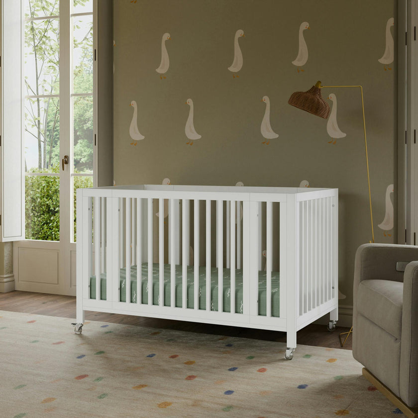 Rolli 9-in-1 Convertible All-Stages® Crib with Bassinet & Toddler Bed Conversion Kits in White