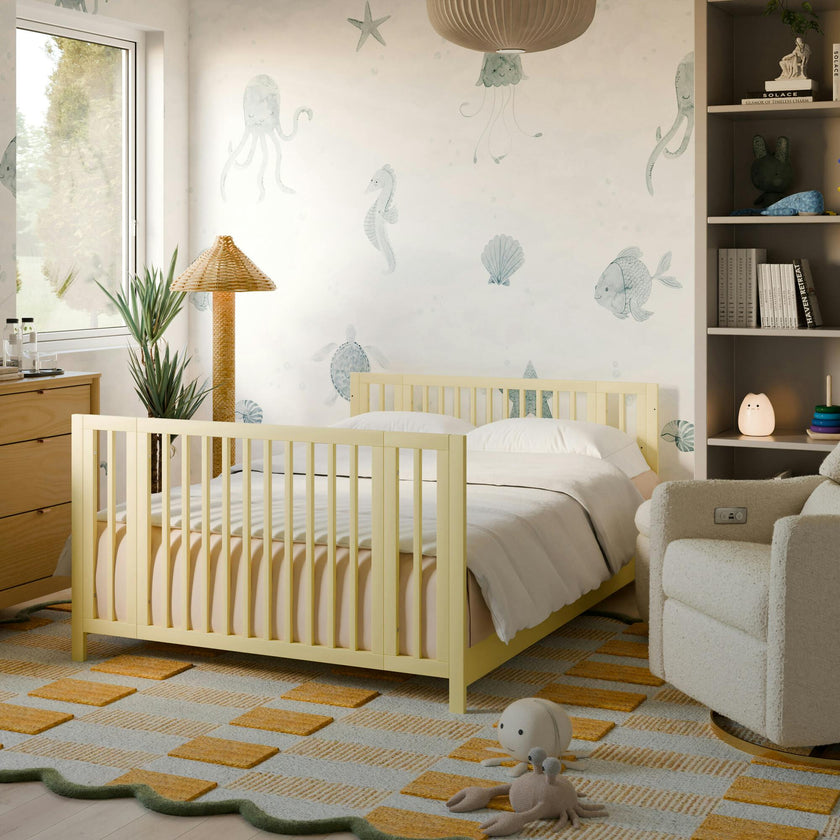 Rolli 9-in-1 Convertible All-Stages® Crib with Bassinet & Toddler Bed Conversion Kits in Pale Yellow