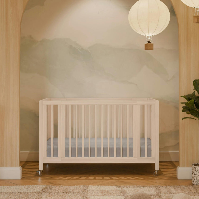 Rolli 9-in-1 Convertible All-Stages® Crib with Bassinet & Toddler Bed Conversion Kits in Washed Natural