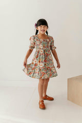 Girls Short Sleeve Smocked Babydoll Dress in Hedde Floral