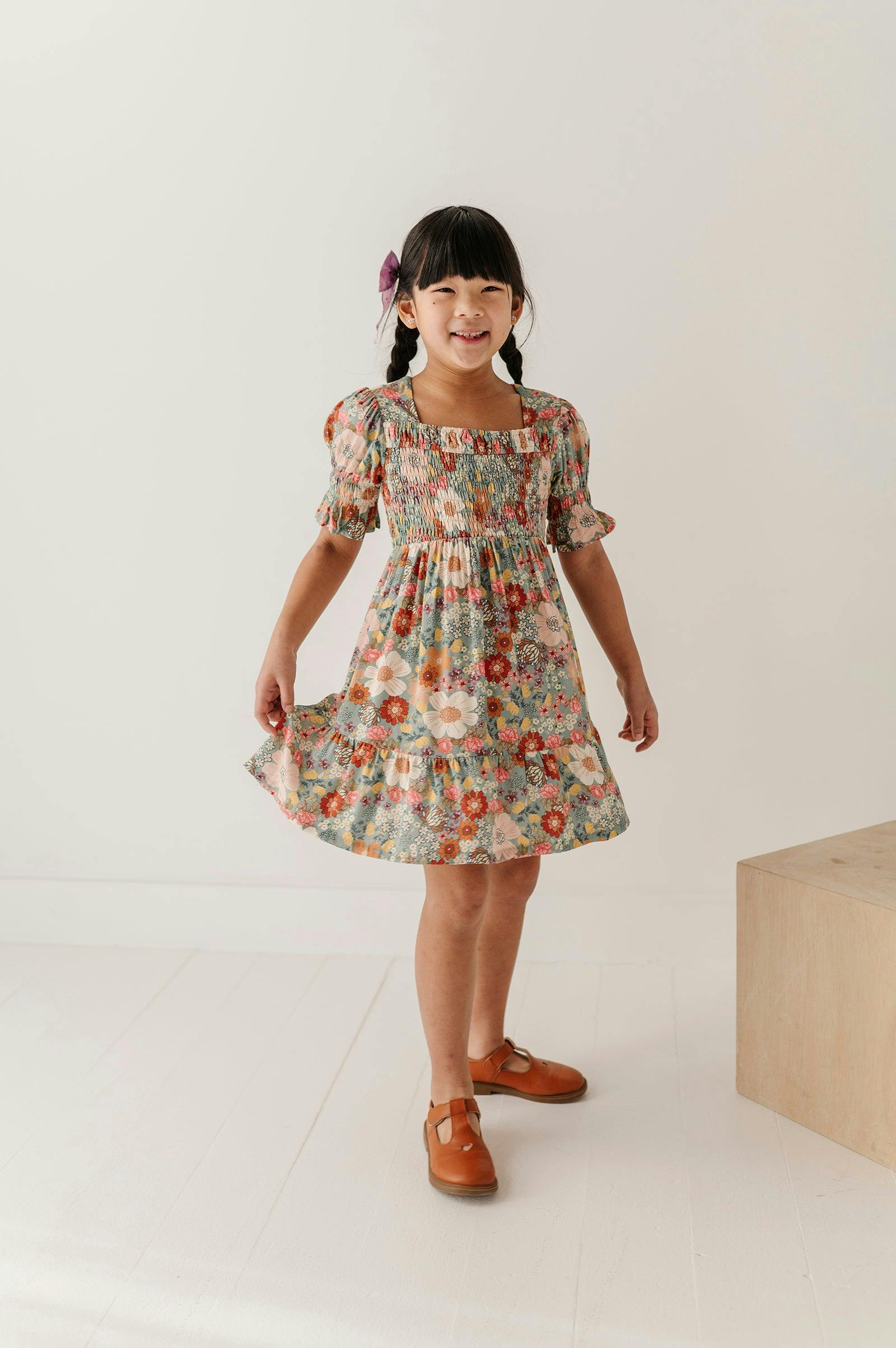 Girls Short Sleeve Smocked Babydoll Dress in Hedde Floral