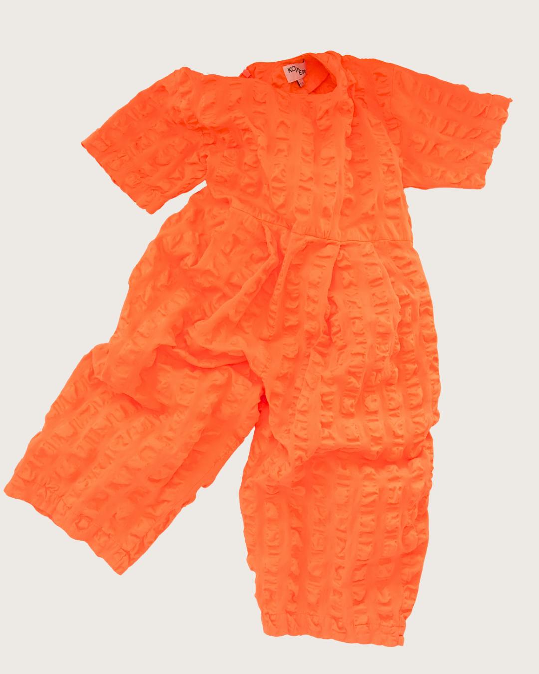 Dorian Orange seersucker jumpsuit