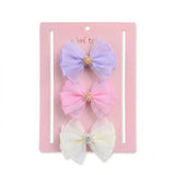 Multicolor Pearl Cluster Bow Clip Set