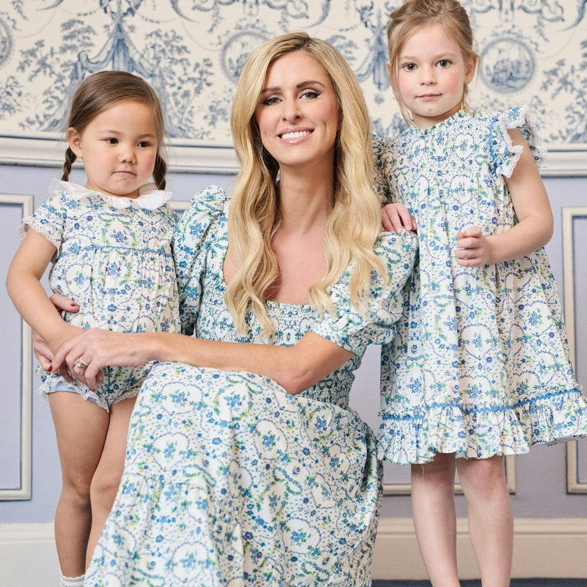 Nicky Hilton x La Coqueta Blue Bow Floral Lily-Grace Baby Girl Romper