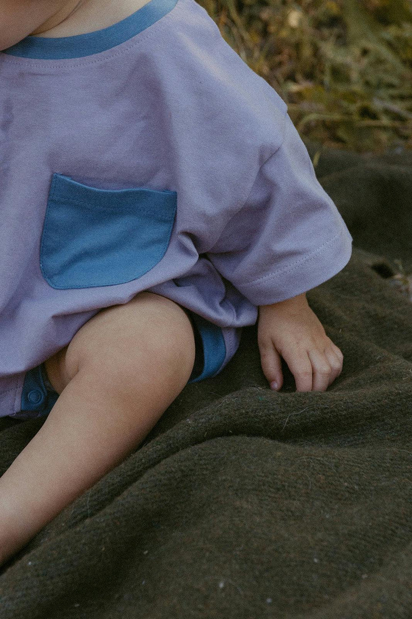 Cory Pocket Romper in Purple Ash