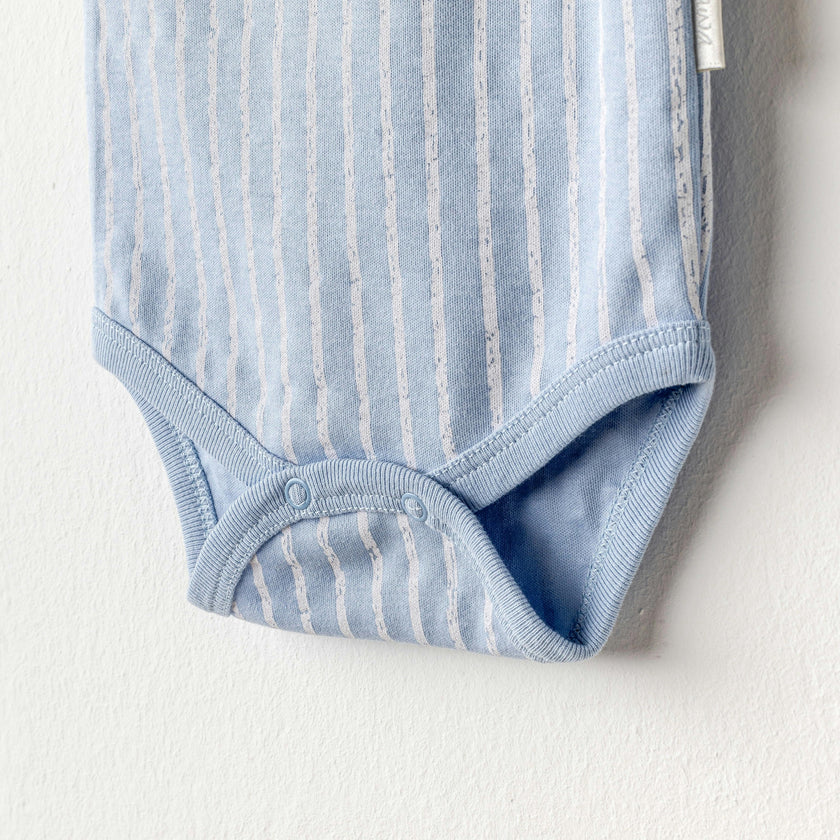 Beige and Blue Dino Bodysuits