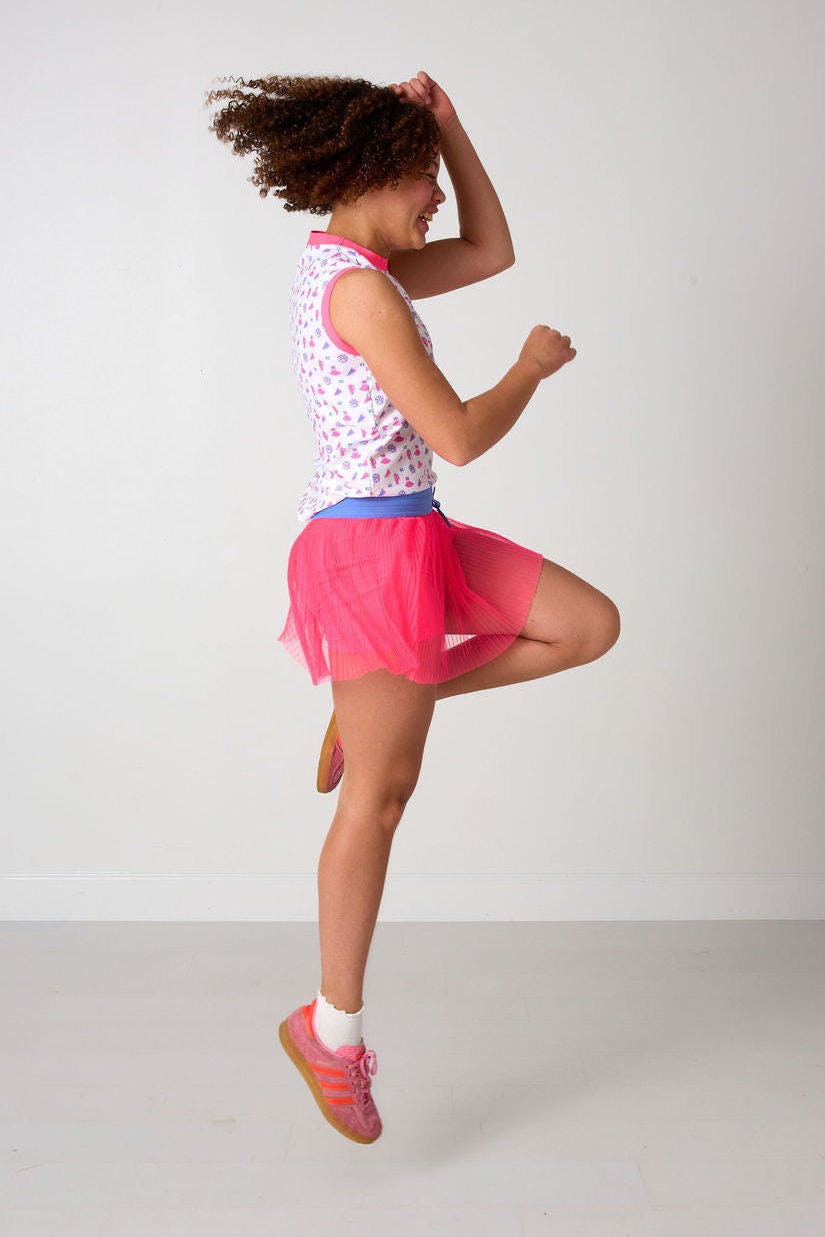 neon pink pleated skort