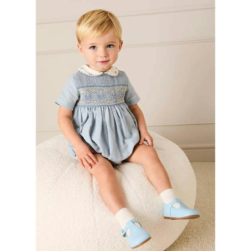 Pepa London Hand Smocked Peter Pan Collar Short Sleeve Romper in Sky Blue (3mths-2yrs) Luxury Childrenswear