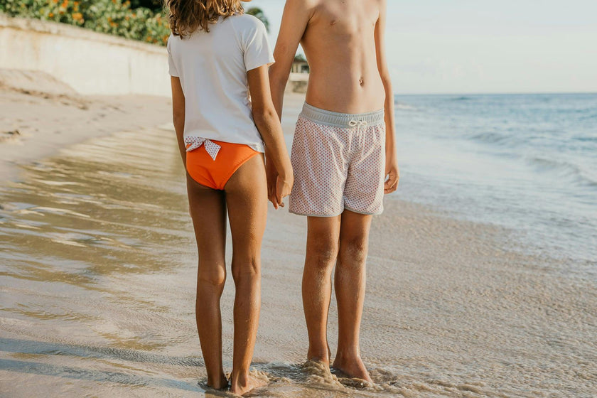 Isabella swim pants in mandarinred and scales print