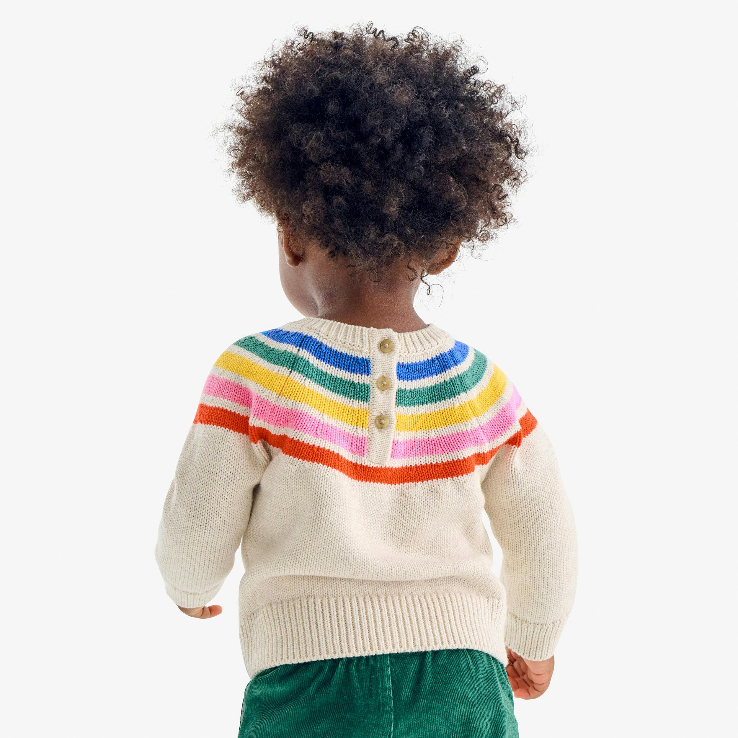 Baby sweater in rainbow stripe