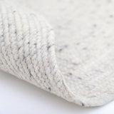 Neethu Hand-Crafted Felted Wool Round Rug, Natural