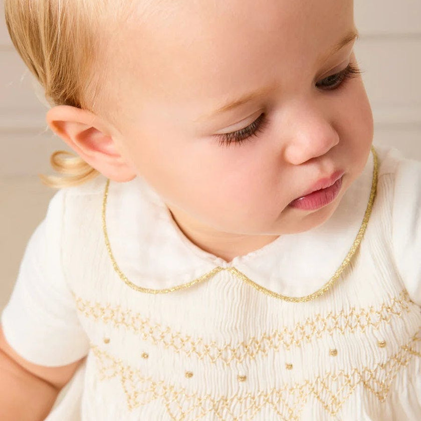 Hand Smocked Gold Embroidered Short Sleeve Romper in Ivory (3mths-2yrs)